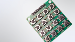 Image of medium-stroke tactile switches on a PCB board